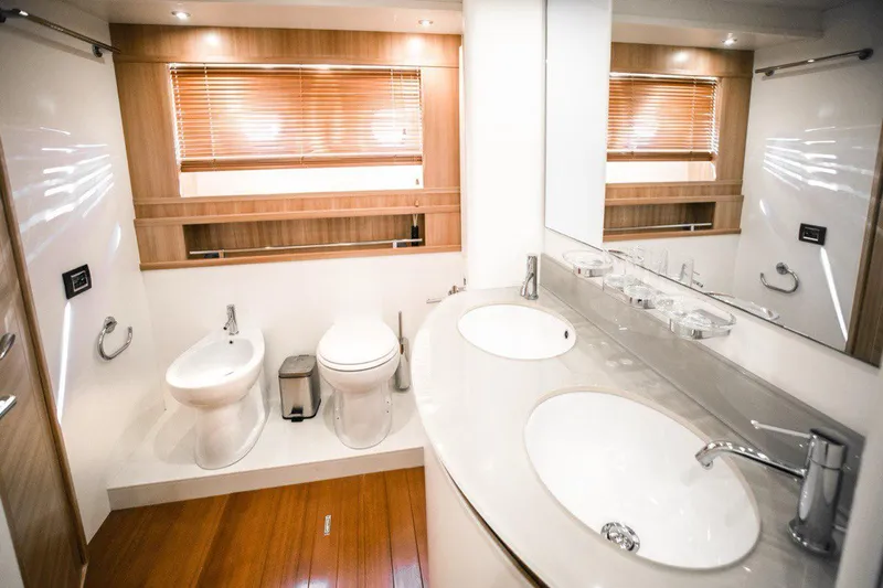  Yacht Photos Pics Luxurious bathroom in 2008 Dalla Pieta 80 yacht with modern fixtures and wooden accents.