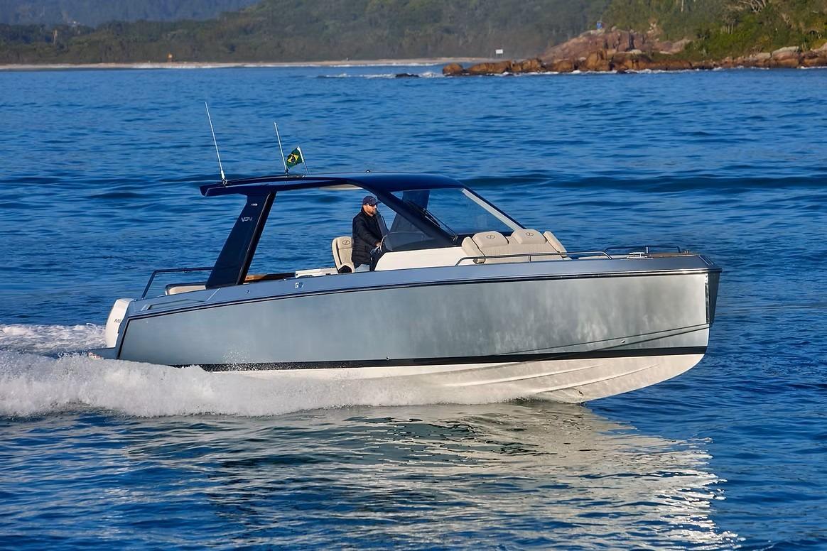 2027 Schaefer V34 boat cruising on blue ocean waters.