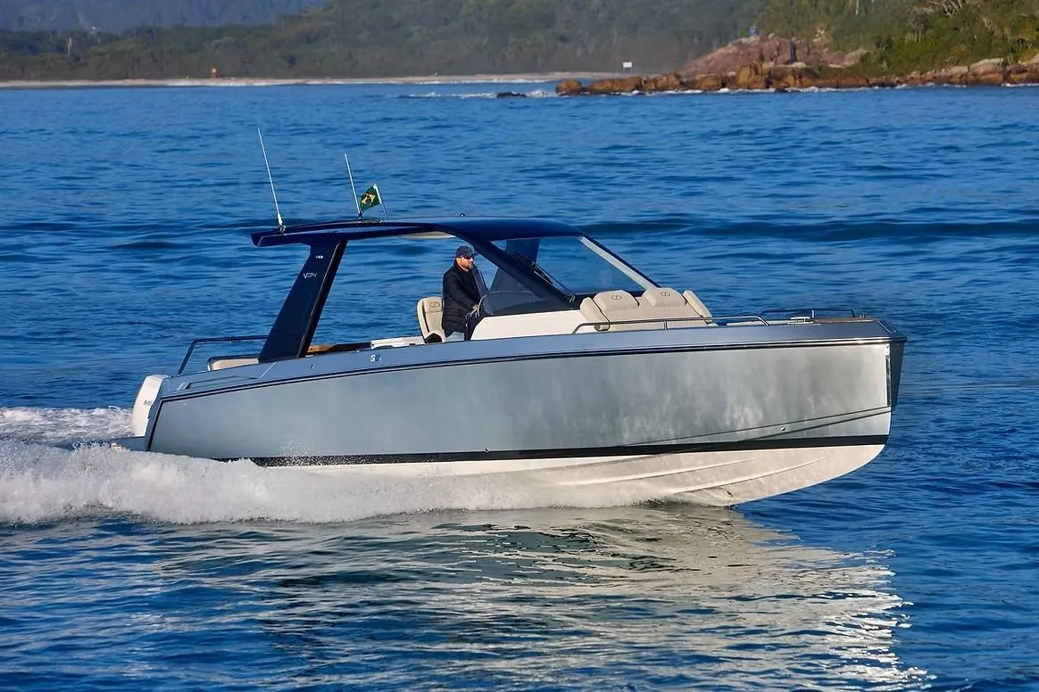 2027 Schaefer V34 boat cruising on blue ocean waters.