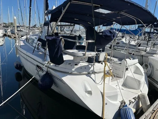 Junebug Yacht Photos Pics 2008 Catalina 350 MkII sailboat docked in marina.