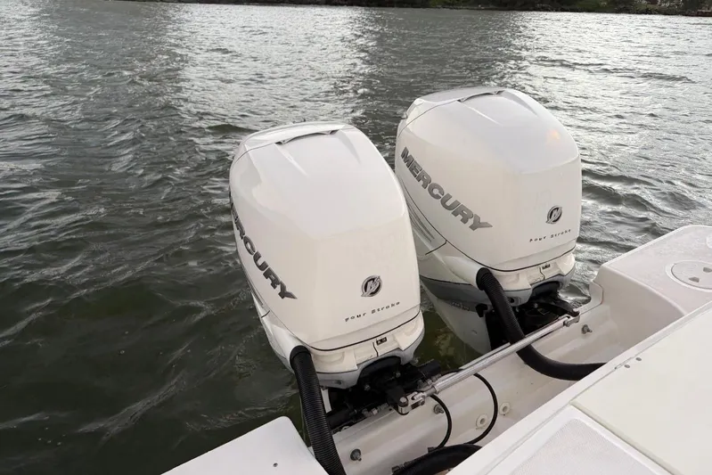  Yacht Photos Pics Twin Mercury outboard engines on a 2017 Boston Whaler 330 Outrage boat.