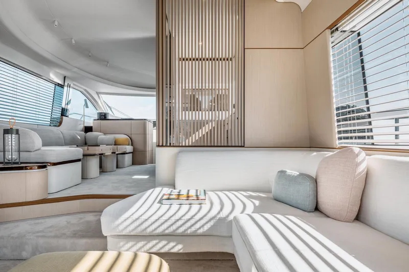  Yacht Photos Pics Luxurious interior of 2024 Azimut 68 yacht with modern seating and elegant design.