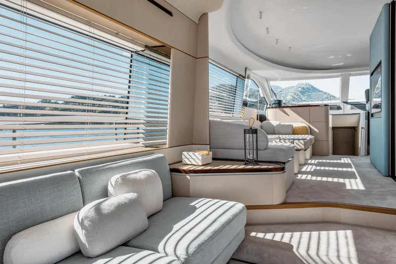  Yacht Photos Pics Luxurious interior of 2024 Azimut 68 yacht with modern seating and panoramic windows.
