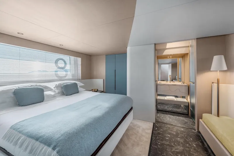  Yacht Photos Pics Luxurious bedroom interior of 2024 Azimut 68 yacht with modern design and elegant furnishings.