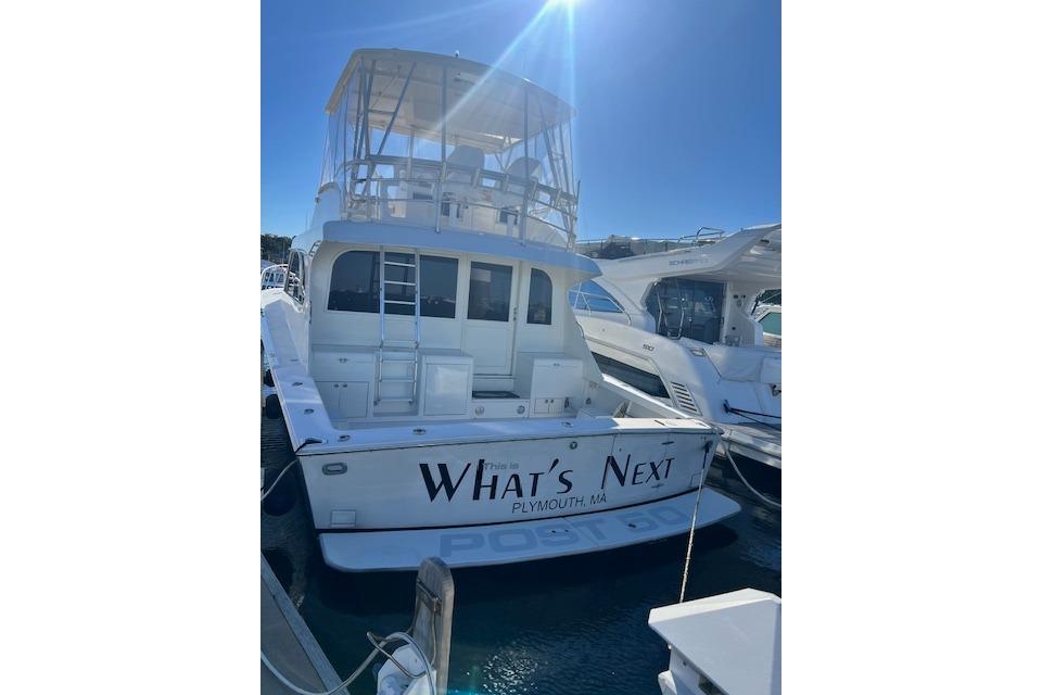 1995 Post 50 Convertible yacht named "What's Next" docked in Plymouth, MA.