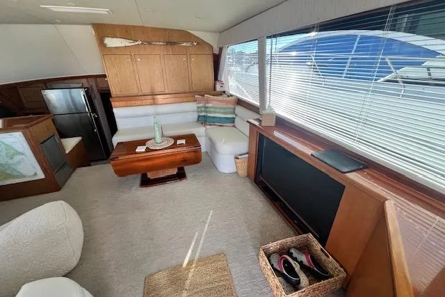 What's Next Yacht Photos Pics Luxurious interior of a 1995 Post 50 Convertible yacht with modern furnishings.