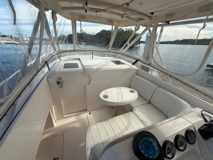  Yacht Photos Pics 2006 Intrepid 350 Center Console boat interior with seating and control panel.