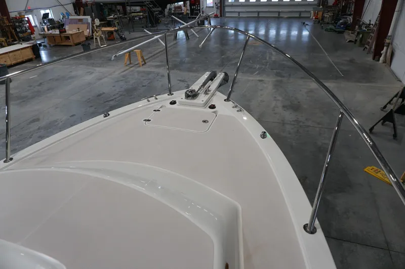 Halcyon Yacht Photos Pics 2006 Back Cove 29 boat deck in a spacious indoor workshop.