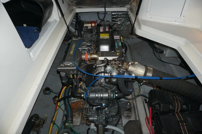 Halcyon Yacht Photos Pics Engine compartment of a 2006 Back Cove 29 boat, showcasing detailed mechanical components.