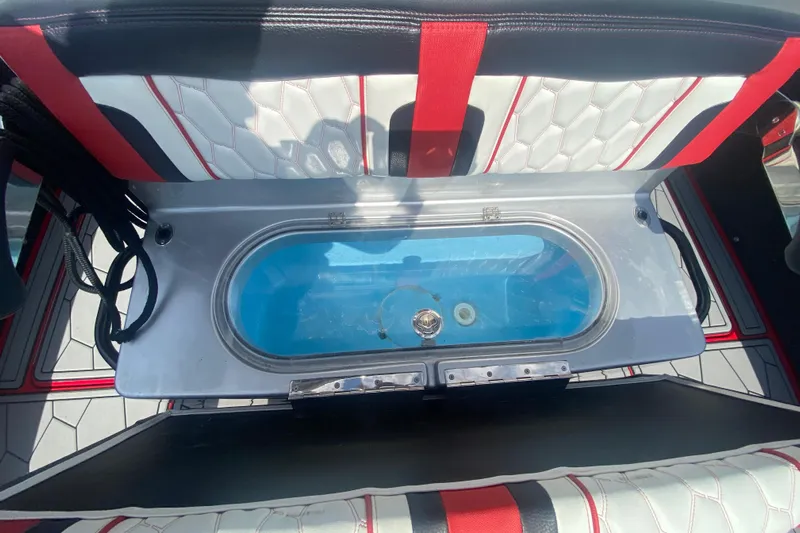  Yacht Photos Pics 2021 Fountain 34 SC boat interior with livewell and stylish seating.