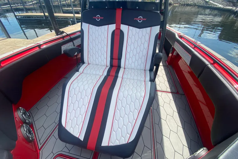  Yacht Photos Pics 2021 Fountain 34 SC boat interior with stylish red, white, and black seating.
