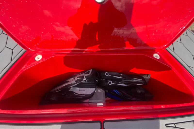  Yacht Photos Pics Open red storage compartment on 2021 Fountain 34 SC boat with diving gear inside.