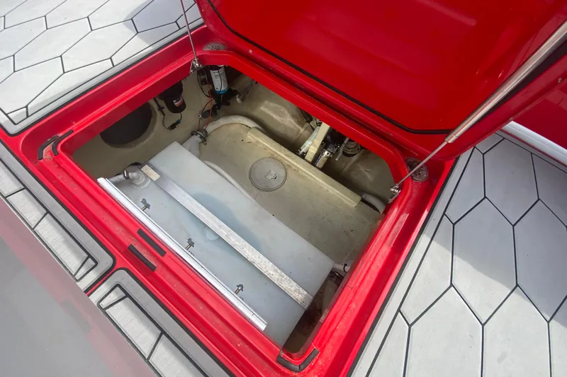  Yacht Photos Pics Open hatch of 2021 Fountain 34 SC boat showing internal components.