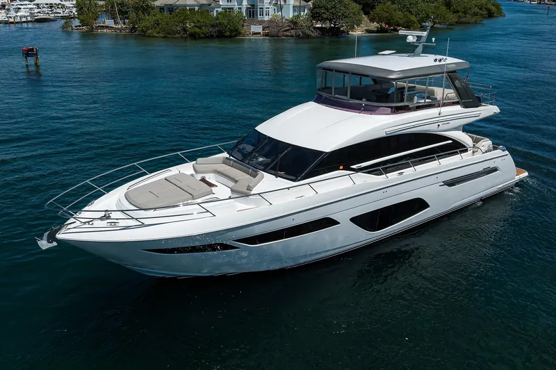 Miss Amy Yacht Photos Pics Luxury 2020 Princess F70 yacht cruising on clear blue water.