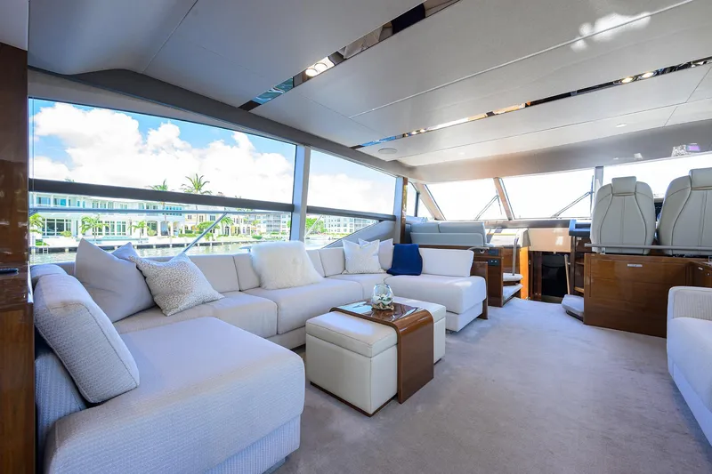 Miss Amy Yacht Photos Pics Luxurious interior of 2020 Princess F70 yacht with elegant seating and panoramic windows.