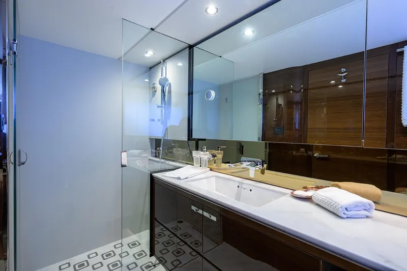 Miss Amy Yacht Photos Pics Luxurious bathroom in 2020 Princess F70 yacht with modern fixtures and elegant design.
