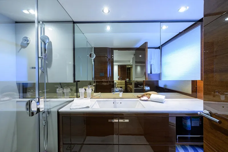 Miss Amy Yacht Photos Pics Luxurious bathroom interior on a 2020 Princess F70 yacht, featuring modern fixtures and elegant design.