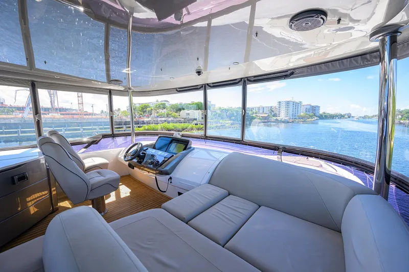 Miss Amy Yacht Photos Pics Luxurious 2020 Princess F70 yacht interior with panoramic water views and modern helm.