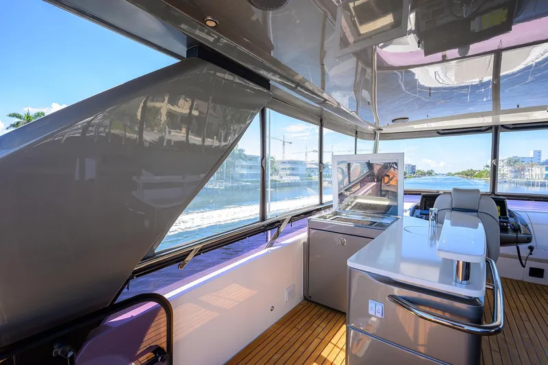 Miss Amy Yacht Photos Pics Luxurious interior of 2020 Princess F70 yacht with modern amenities and scenic water view.