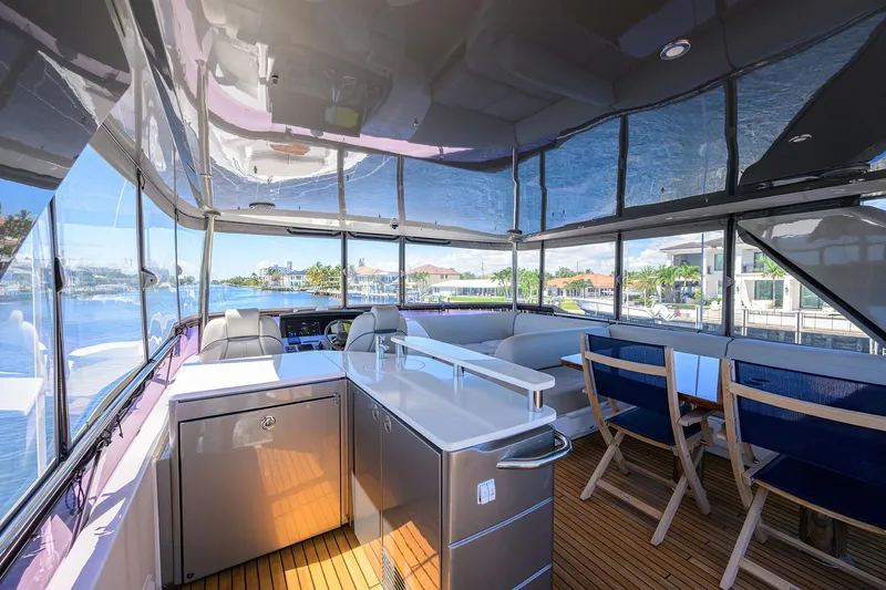 Miss Amy Yacht Photos Pics Luxurious interior of 2020 Princess F70 yacht with modern seating and panoramic views.