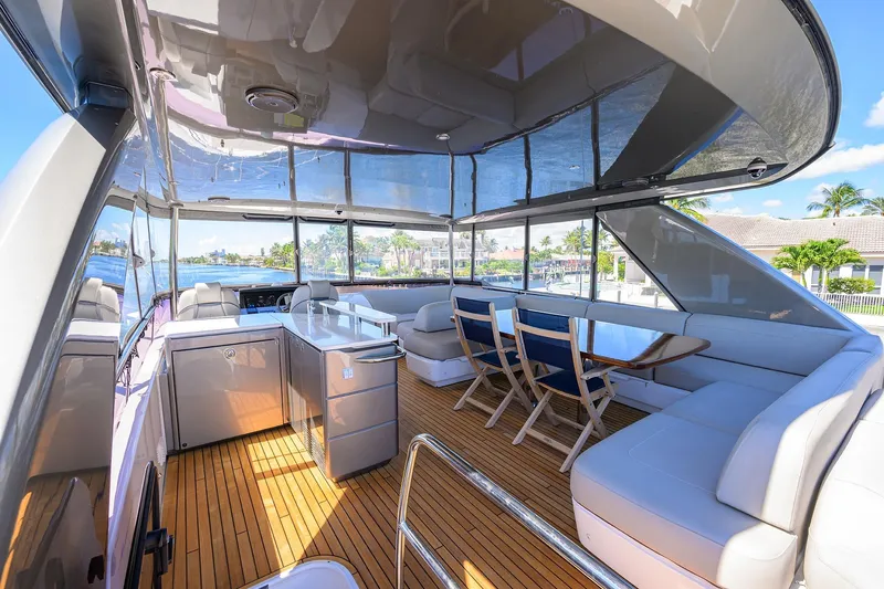 Miss Amy Yacht Photos Pics Luxurious 2020 Princess F70 yacht interior with elegant seating and dining area.