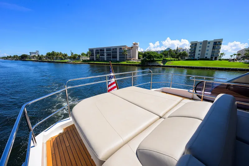 Miss Amy Yacht Photos Pics Luxurious 2020 Princess F70 yacht deck with scenic waterfront view.