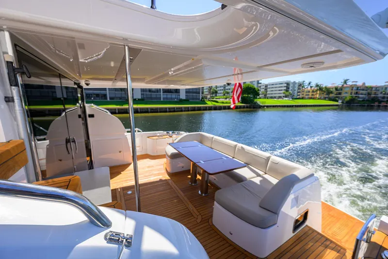Miss Amy Yacht Photos Pics Luxurious 2020 Princess F70 yacht interior with elegant seating and scenic water view.