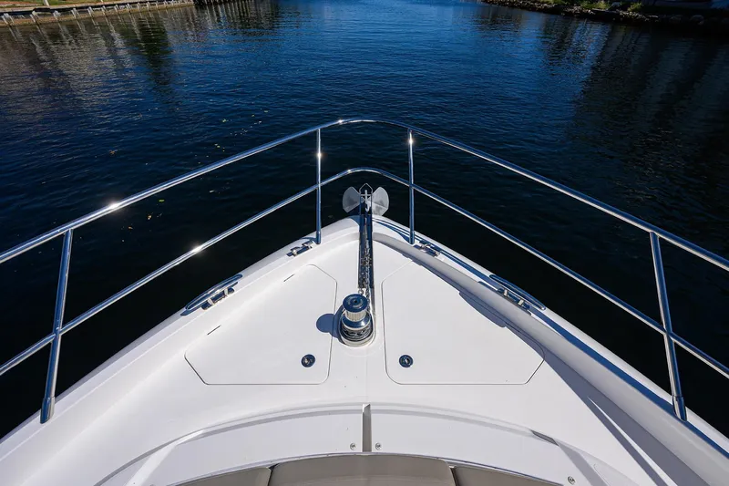 Miss Amy Yacht Photos Pics Bow view of 2020 Princess F70 yacht on calm water.
