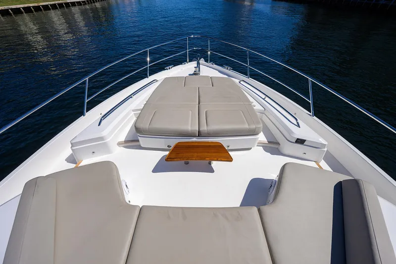 Miss Amy Yacht Photos Pics Luxurious 2020 Princess F70 yacht deck with cushioned seating and sleek design.