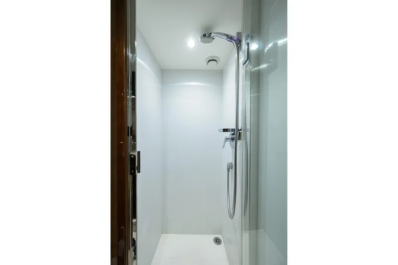 Miss Amy Yacht Photos Pics Modern shower area in a 2020 Princess F70 yacht, featuring sleek design and chrome fixtures.