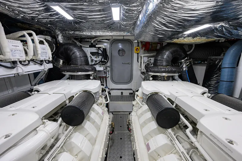 Miss Amy Yacht Photos Pics Engine room of a 2020 Princess F70 yacht, featuring dual engines and advanced ventilation.