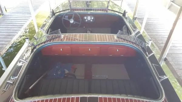  Yacht Photos Pics 1989 Hacker-Craft Triple Cockpit boat with wooden interior and classic design.