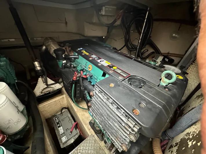  Yacht Photos Pics Engine compartment of a 2006 Formula 40pc boat, featuring visible components and wiring.