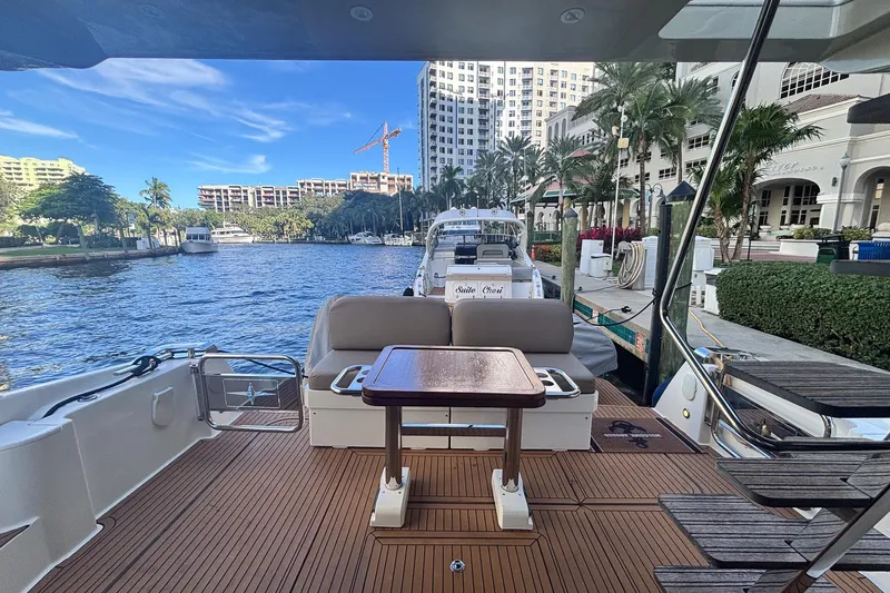 Fly-away Yacht Photos Pics 2015 Bavaria 420 Virtess Coupe docked, featuring a spacious deck with scenic waterfront view.