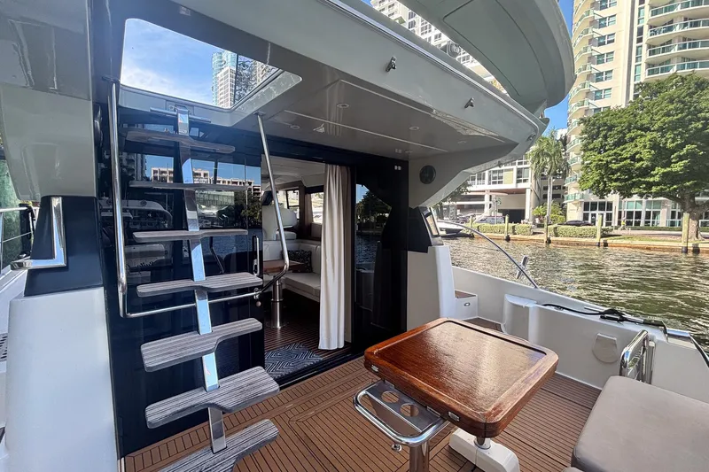 Fly-away Yacht Photos Pics 2015 Bavaria 420 Virtess Coupe yacht interior with modern design and waterfront view.