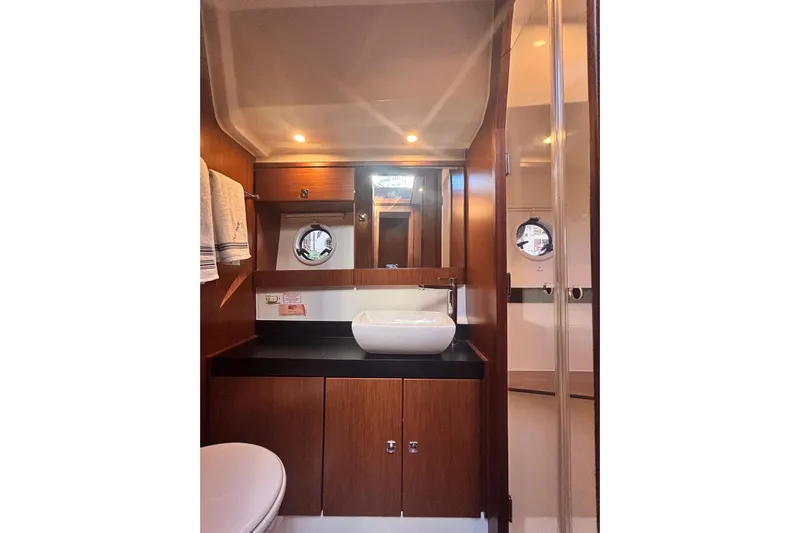 Fly-away Yacht Photos Pics Luxurious bathroom interior of 2015 Bavaria 420 Virtess Coupe yacht.