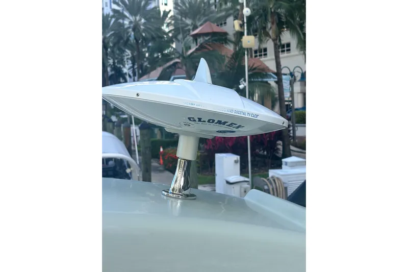 Fly-away Yacht Photos Pics Glomex TV antenna on 2015 Bavaria 420 Virtess Coupe yacht, outdoor setting.