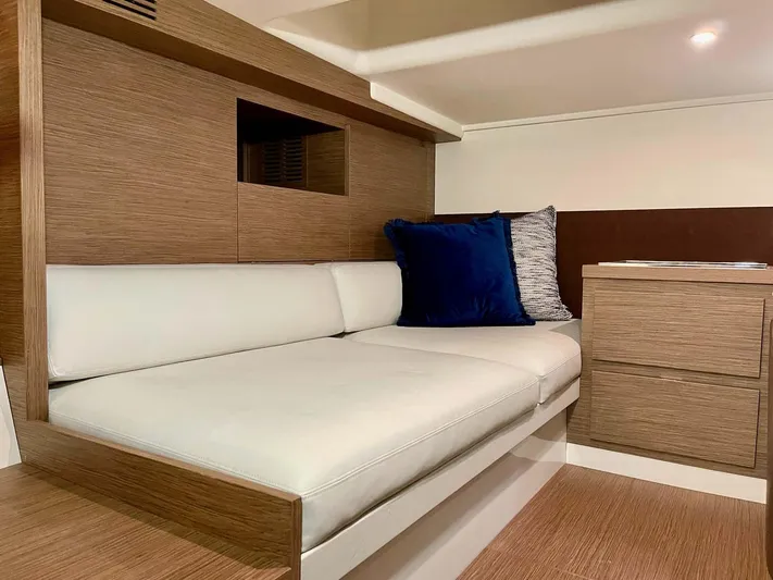  Yacht Photos Pics 2023 Solaris Power SP 44 interior with modern wood finish and comfortable seating.