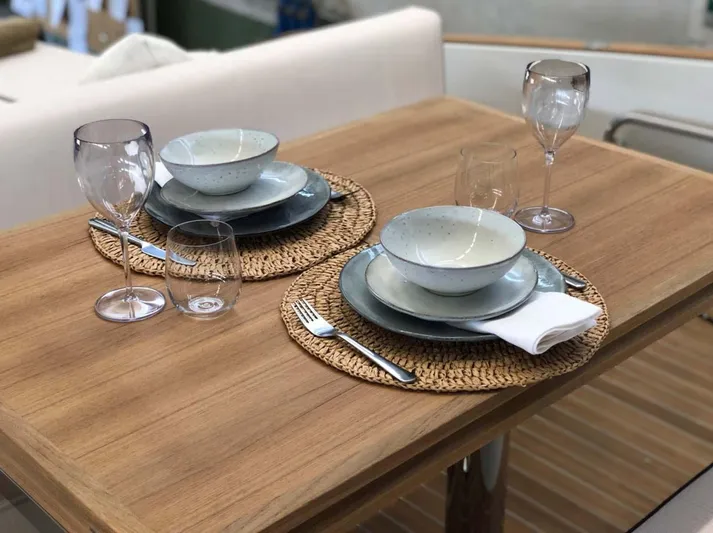  Yacht Photos Pics Elegant dining setup on Solaris Power SP 44 yacht, 2023 model.