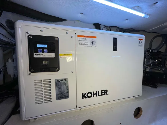  Yacht Photos Pics Kohler generator inside 2023 Solaris Power SP 44 yacht engine room.
