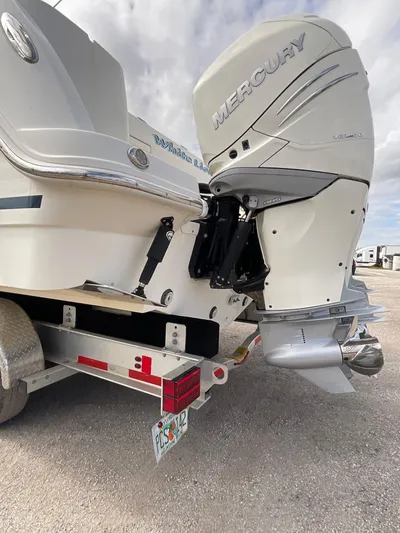  Yacht Photos Pics 2019 Boston Whaler 345 Conquest with Mercury outboard engine on trailer.