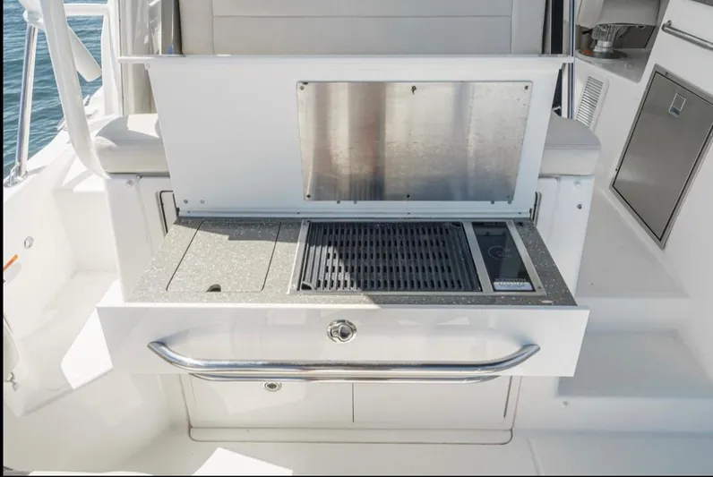  Yacht Photos Pics Outdoor grill station on a 2019 Boston Whaler 345 Conquest boat.
