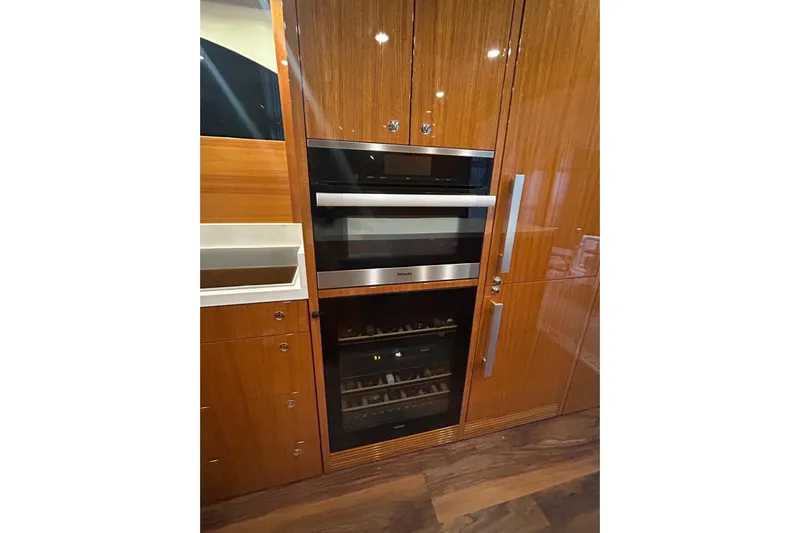  Yacht Photos Pics Luxury kitchen appliances in 2020 Maritimo M64 yacht interior.