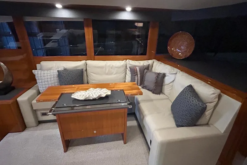  Yacht Photos Pics Luxurious interior of 2020 Maritimo M64 yacht with elegant seating and decor.