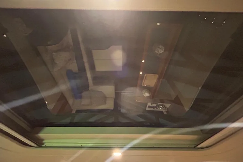  Yacht Photos Pics Interior view of 2020 Maritimo M64 yacht through a glass ceiling.