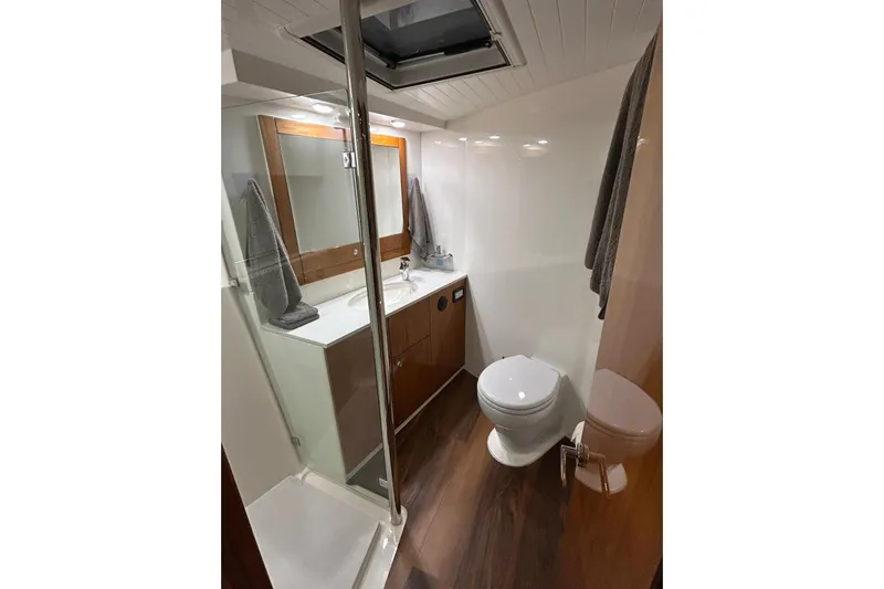  Yacht Photos Pics Luxurious bathroom in 2020 Maritimo M64 yacht with modern fixtures and elegant design.