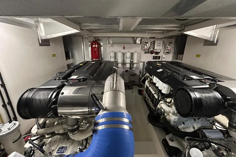  Yacht Photos Pics Engine room of a 2020 Maritimo M64 yacht, featuring dual engines and advanced equipment.