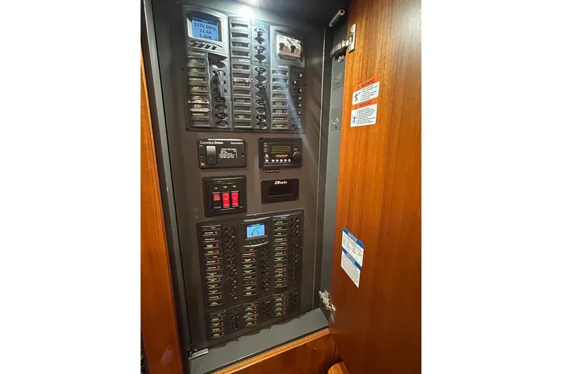  Yacht Photos Pics Electrical control panel inside 2020 Maritimo M64 yacht, featuring various switches and displays.