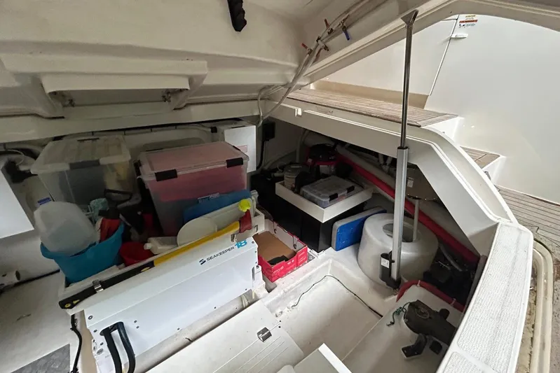  Yacht Photos Pics Storage compartment of a 2020 Maritimo M64 yacht, featuring organized equipment and supplies.