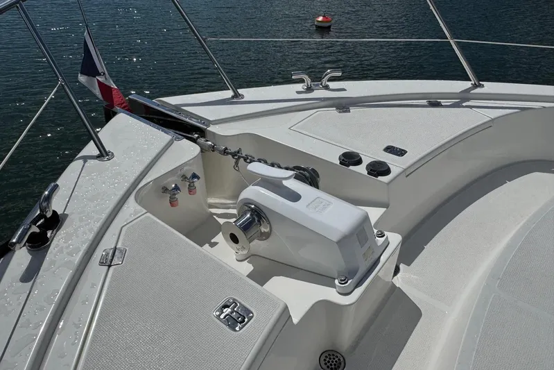  Yacht Photos Pics 2020 Maritimo M64 yacht deck with anchor chain and water view.